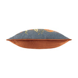 Side view of the Hawthorn printed velvet chenille cushion showing petrol-blue floral chenille front with rust piping and plain rust velvet reverse, on a white background.