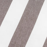 Close-up of the Hayle Reversible Cotton Cushion in chocolate, showing wide diagonal brown and white striped cotton fabric texture.