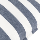 Close-up of the Hayle Reversible Cotton Cushion in navy, showing bold wide navy-and-white stripes and the cotton weave texture with a visible edge seam.