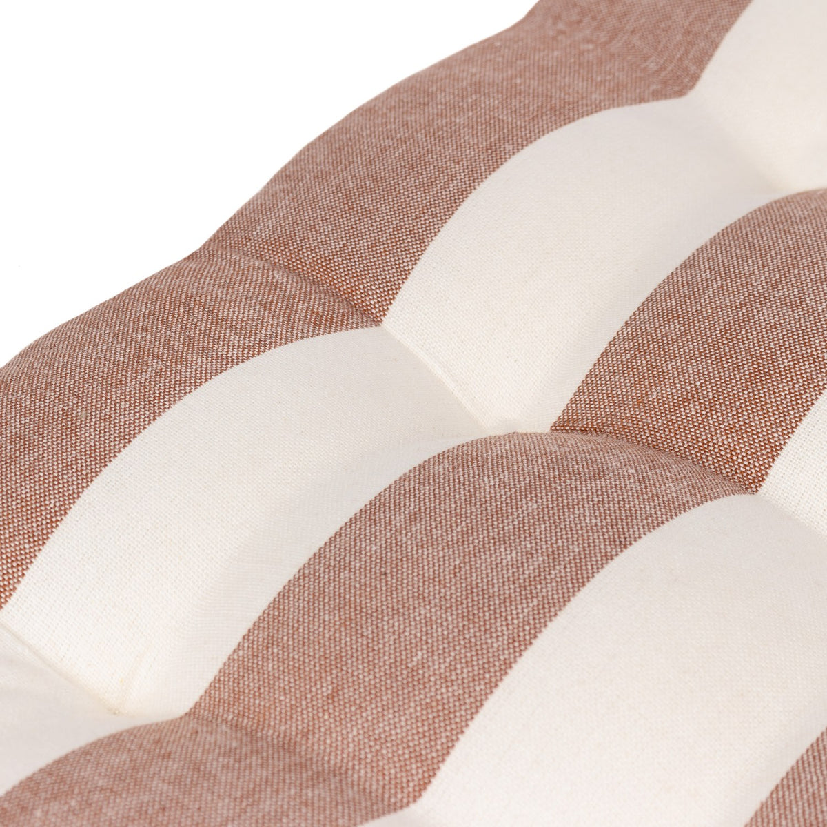 Close-up of the Hayle Reversible Cotton Seat Pad in pecan, showing tufted broad brown and cream stripes on a cotton surface.