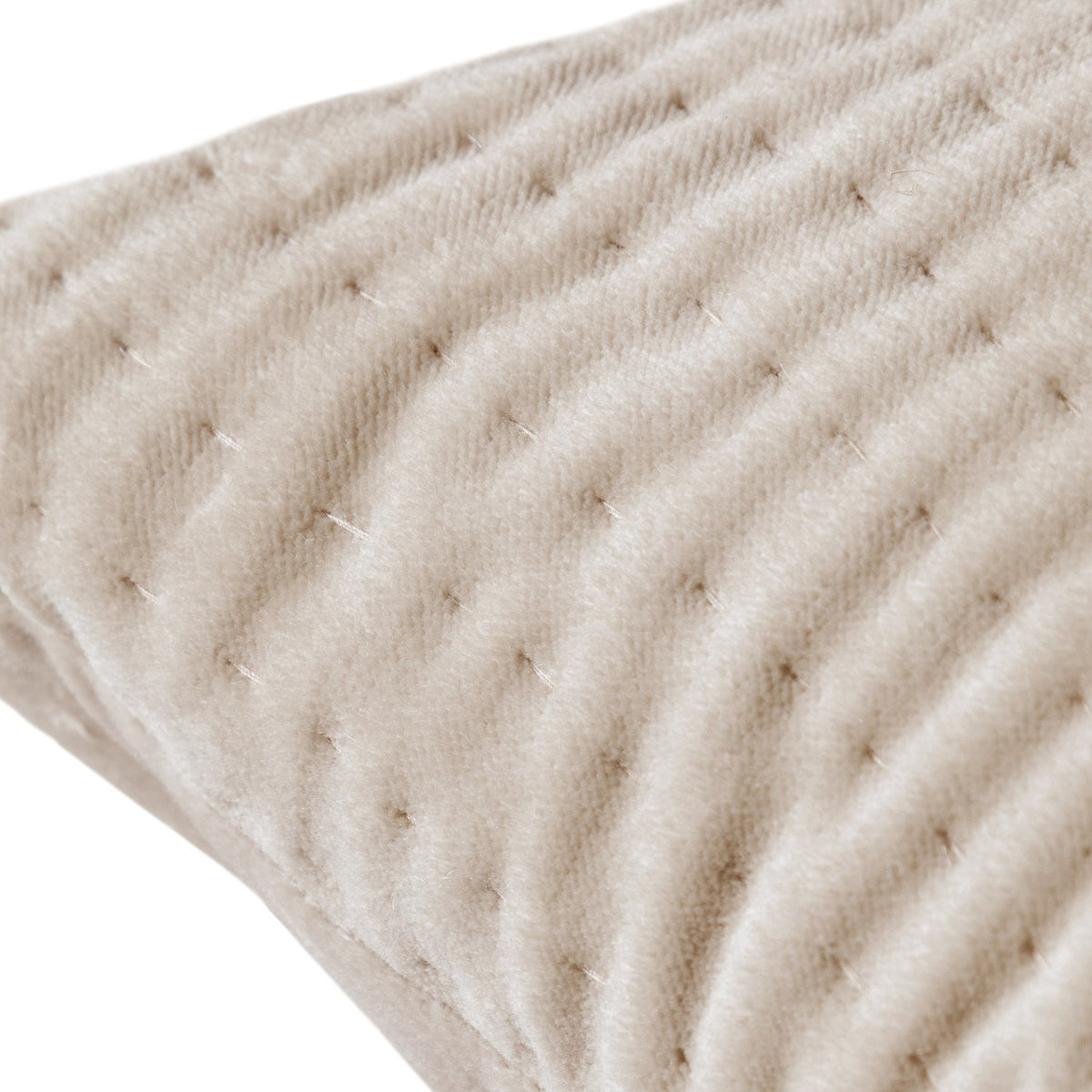 Close-up of the Haze Plain Velvet Cushion in quartz, showing quilted velvet with fine ribbed texture and subtle diamond stitching in a soft beige-greige tone.