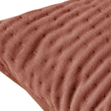 Close-up of the Haze Plain Velvet Cushion in Persimmon, showing quilted velvet fabric with fine ribbed texture in a warm terracotta-brown tone.