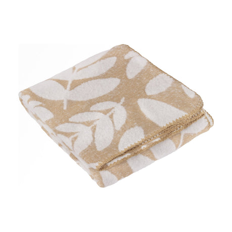 Folded Hazel Botanical Polyester Throw in oatmeal, showing a reversible white leaf pattern and blanket-stitched edge trim, on a plain white background.