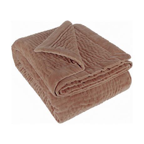 Haze Velvet Cotton Throw in coral, folded to show hand-quilted stitched texture and soft velvet finish, on a plain white background.