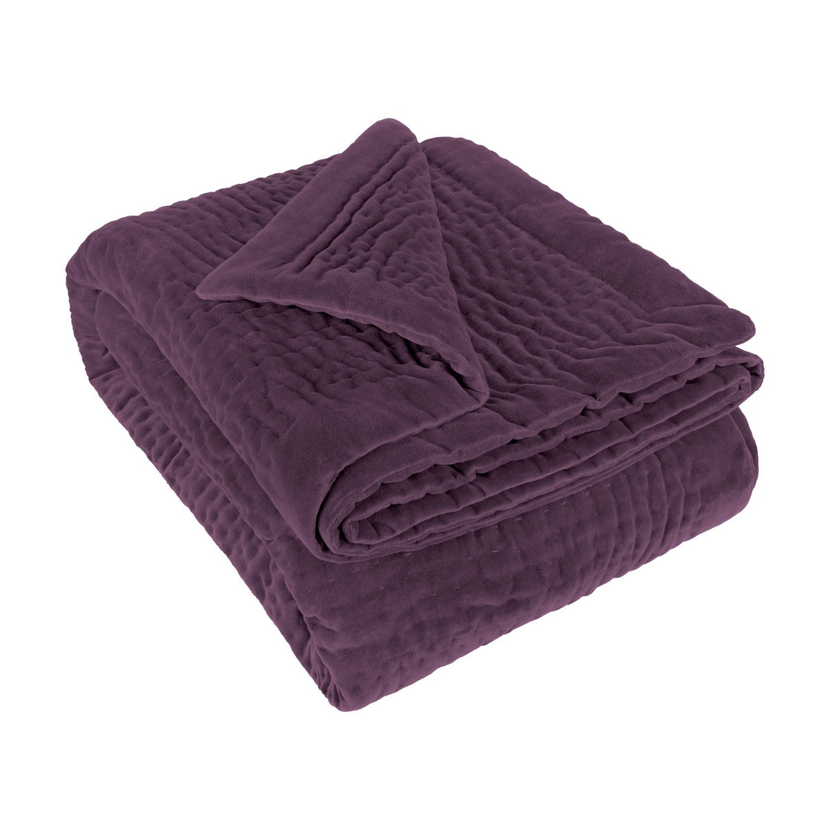 Haze Velvet Cotton Throw in Plum, folded to show hand-quilted rippled texture on a soft velvet finish, set against a plain white background.