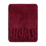 Harlan Borg Sherpa Plain Polyester Throw in burgundy, showing dense curly pile fleece with twisted tassel fringe along one edge, shown flat on a plain white background.