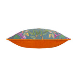Side view of the House of Bloom Floral Velvet Cushion, showing blue-grey floral velvet front with pink and orange blooms, plain orange velvet back, set on a white background.