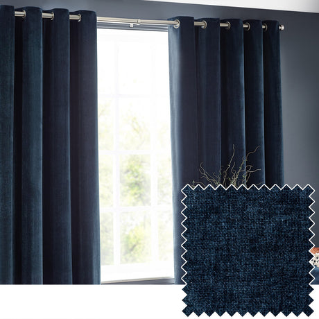 Navy chenille velvet eyelet curtains hung on a brushed metal pole beside a window, with a fabric swatch inset showing the dense woven texture.