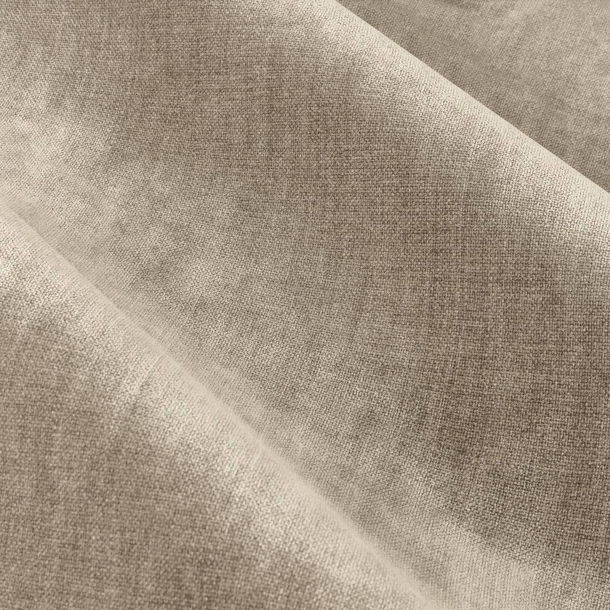 Close-up of Heavy Chenille Plain Velvet Pencil Pleat Curtains in natural beige, showing draped folds and the soft, textured chenille weave.