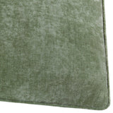 Close-up of the Heavy Chenille Plain Velvet Cushion in eucalyptus green, showing the dense textured fabric and piped edge along the corner.