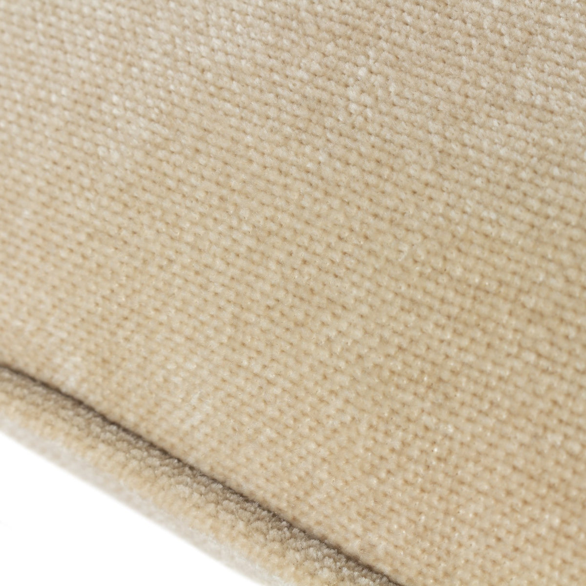 Close-up of the Heavy Chenille Eyelet Velvet Cushion in natural cream, showing the textured woven chenille fabric and stitched edge seam.