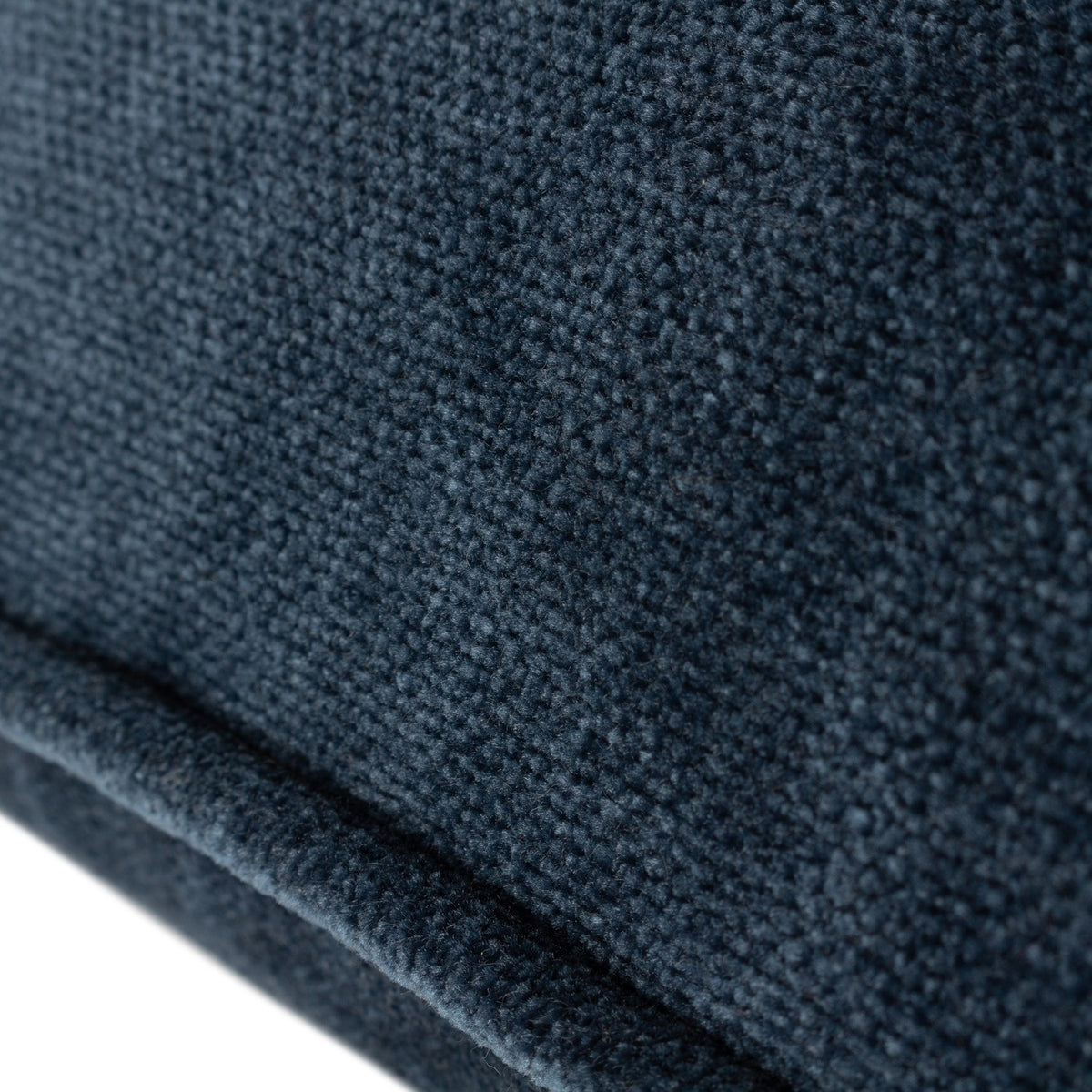 Close-up of the Heavy Chenille Eyelet Velvet Cushion in navy, showing the dense chenille pile texture and piped edge trim.