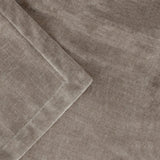 Heavy Chenille Eyelet Velvet Throw in greige, close-up of dense velvet chenille pile with folded edge showing fine woven texture.