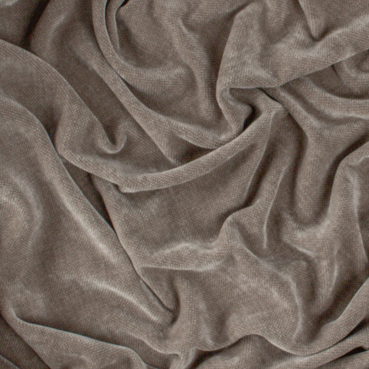 Heavy Chenille Eyelet Velvet Throw in greige, close-up of the soft draped fabric showing its dense, fine-woven velvet pile texture.