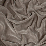 Heavy Chenille Eyelet Velvet Throw in greige, close-up of the soft draped fabric showing its dense, fine-woven velvet pile texture.