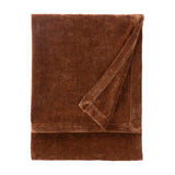 Heavy Chenille Eyelet Velvet Throw in Nutmeg brown, folded showing a soft tufted pile with a bordered edge, on a plain white background.
