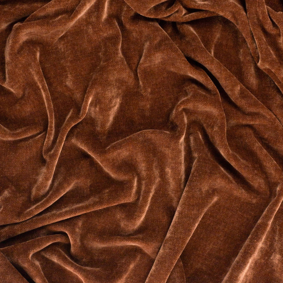 Heavy Chenille Eyelet Velvet Throw in nutmeg brown, close-up showing soft folds and the fabric's tufted pile with a subtle matt-to-lustrous sheen.