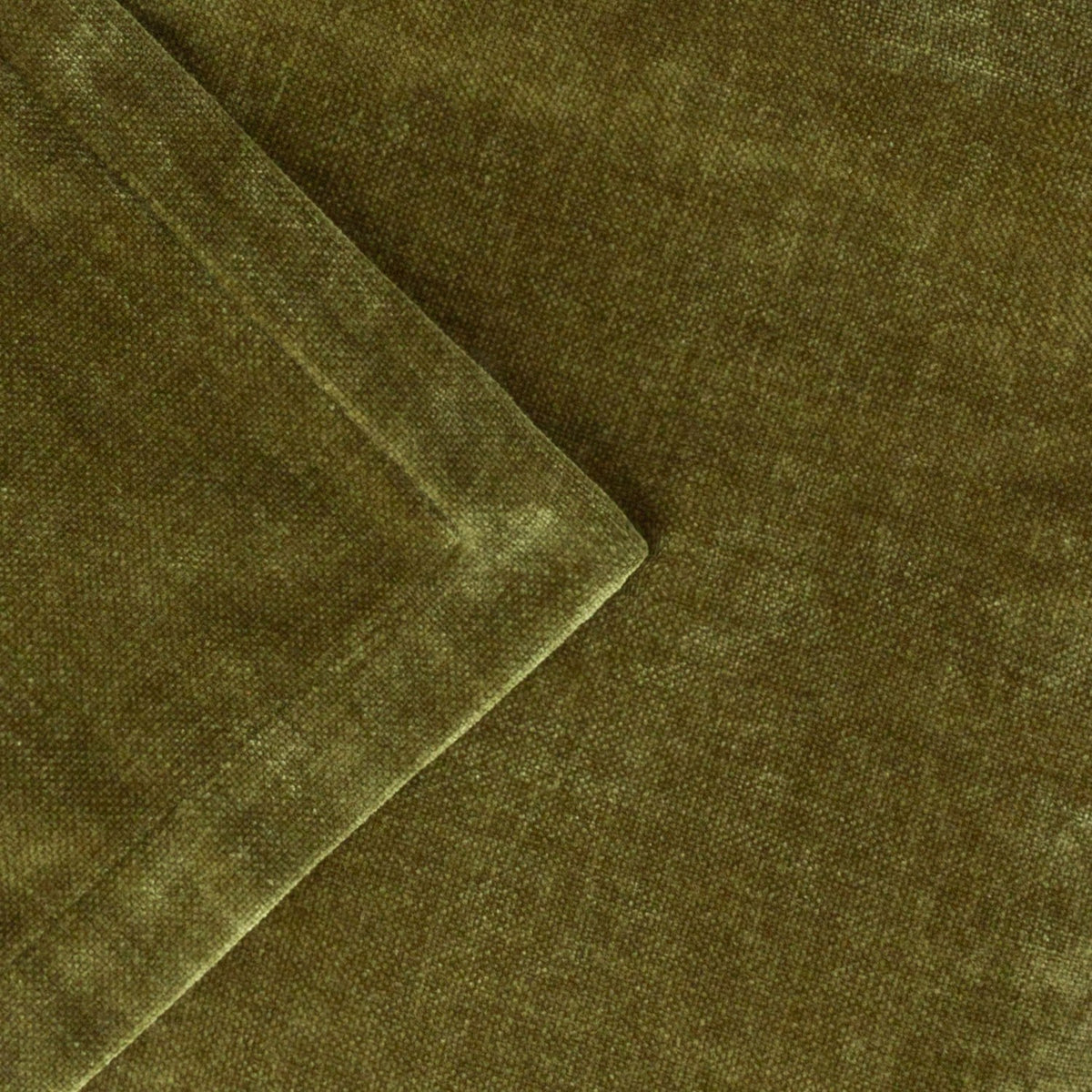 Close-up of the Heavy Chenille Eyelet Velvet Throw in olive green, showing a folded corner and the dense, textured pile of the polyester velvet fabric.
