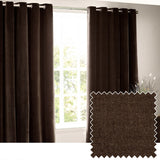 Heavy chenille velvet eyelet curtains in deep brown hung on a metal pole beside a window, shown with a fabric swatch detail of the dense woven pile.