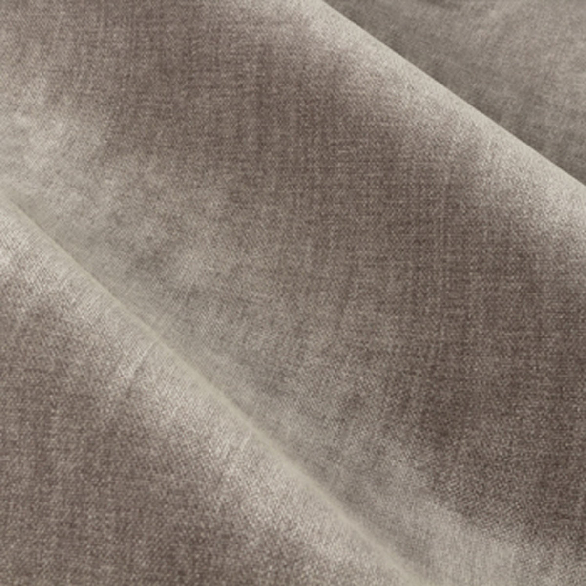 Close-up of Heavy Chenille Velvet Plain Eyelet Curtains in greige, showing the soft grey-brown velvet fabric with folded drape and subtle light-catching texture.