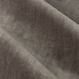Close-up of heavy chenille velvet pencil pleat curtain fabric in greige, showing its soft pile texture and folded drape.