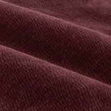 Close-up of Heath eyelet curtains in beetroot washed velvet, showing soft folds and a subtle textured jacquard weave.