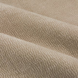 Close-up of Heath Washed Velvet Pencil Pleat Curtains in beige, showing draped fabric folds with a subtle jacquard textured, crumpled-pile finish.