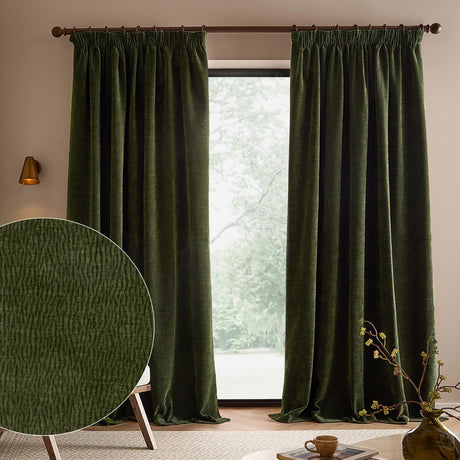 Heath Washed Velvet Pencil Pleat Curtains in olive green hung on a bronze rod by a window, with a fabric texture swatch shown inset.