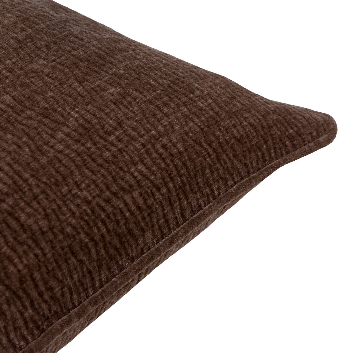 Close-up corner view of the Heath washed velvet jacquard polyester cushion in espresso brown, showing textured weave and piped edge on a white background.