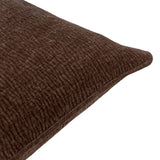Close-up corner view of the Heath washed velvet jacquard polyester cushion in espresso brown, showing textured weave and piped edge on a white background.