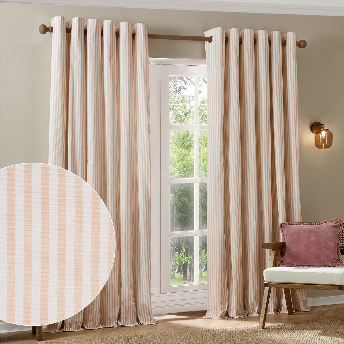 Hebden Cotton Fully Lined Eyelet Curtains in Blush, showing pink and cream vertical stripe panels with metal eyelet headers hung on a wooden pole beside a window, with fabric swatch detail inset.