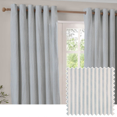 Hebden Cotton Fully Lined Eyelet Curtains in Mineral Blue, vertical stripe pattern on off-white cotton, hung on a wooden pole beside a window, with fabric swatch shown inset.
