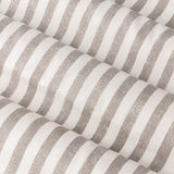 Close-up of Hebden fully lined eyelet curtains in cotton, showing a vertical mole brown stripe woven against a creamy off-white ground with soft rounded folds.