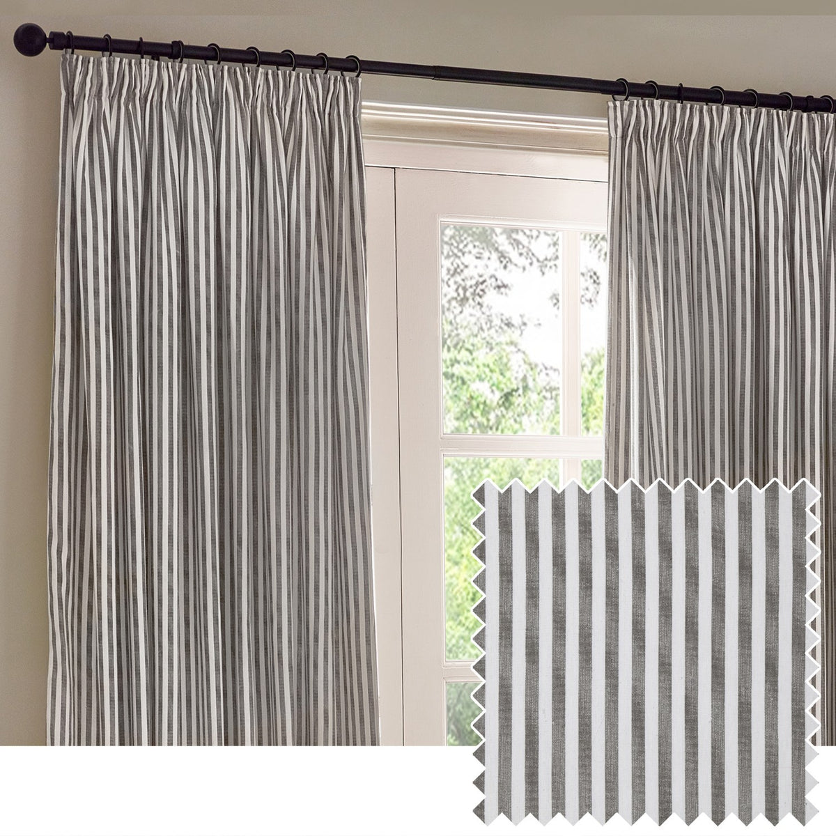 Hebden Striped Cotton Pencil Pleat Curtains in grey-and-white vertical stripe, hung on a black pole beside a window, with a fabric swatch inset.