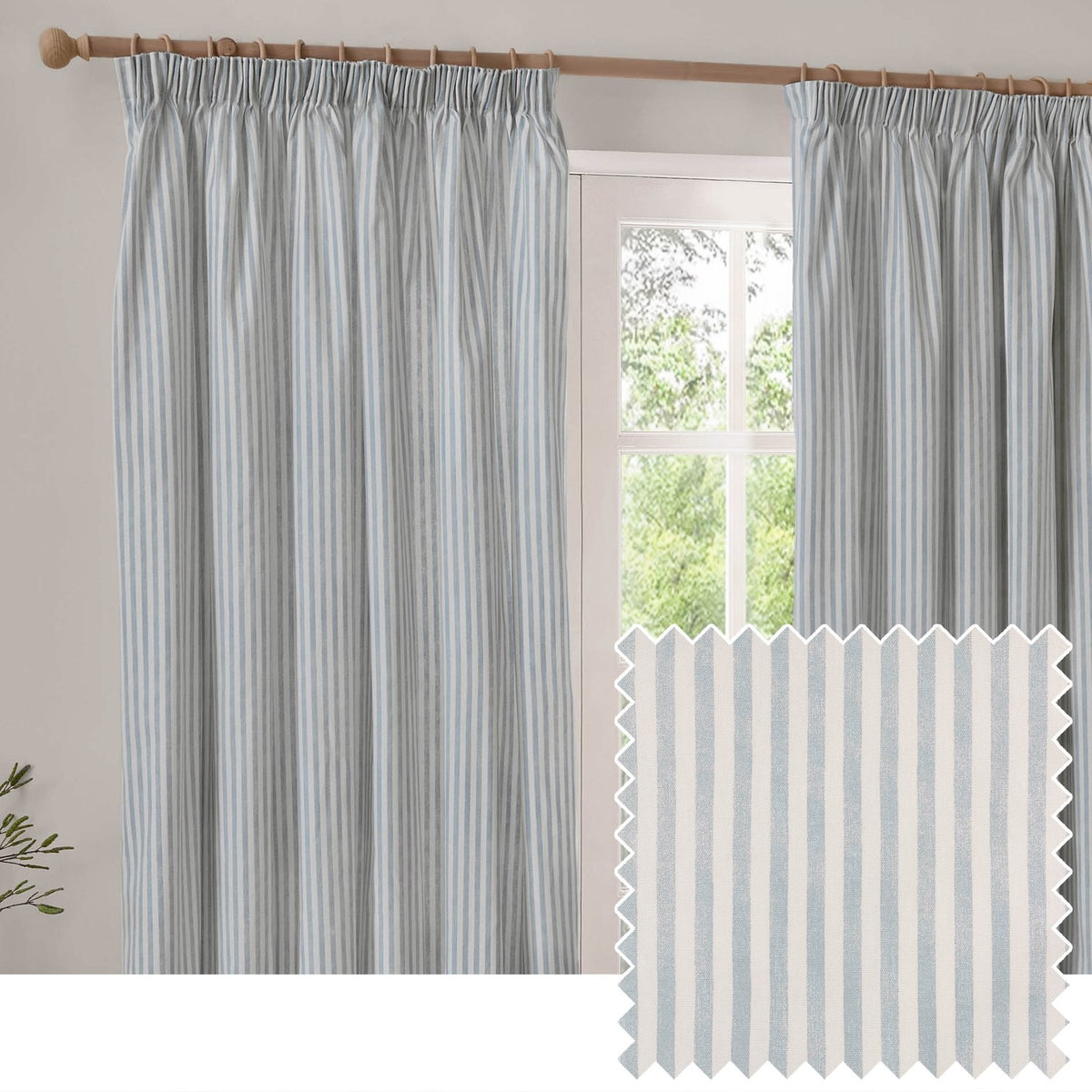 Hebden fully lined cotton pencil pleat curtains in mineral blue stripe, hung on a wooden pole beside a window, with a fabric swatch shown below.