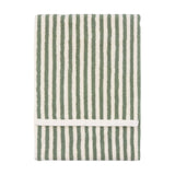 Hebden Striped Cotton Towel in Forest, folded cotton terry towel with vertical green and cream stripes, shown on a plain white background.