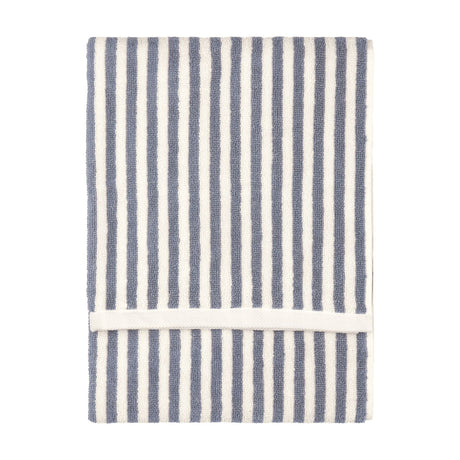 Hebden Striped Cotton Towel in mineral blue, folded flat with vertical woven stripes against a cream ground, shown on a plain white background.