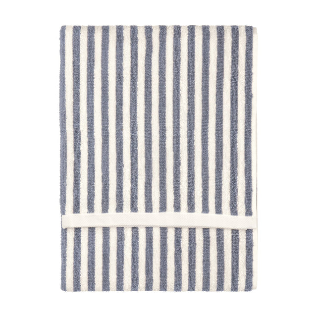 Hebden Striped Cotton Towel in mineral blue, folded flat with vertical woven stripes against a cream ground, shown on a plain white background.