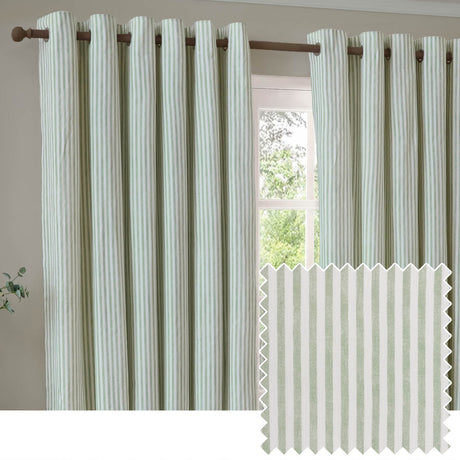 Hebden Cotton Printed Eyelet Curtains in eucalyptus green, showing vertical striped panels with eyelet headings on a wooden pole beside a window, with a fabric swatch inset.