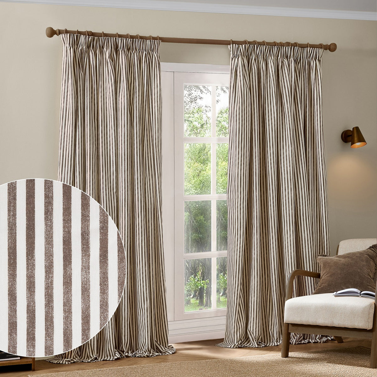 Hebden Striped Cotton Pencil Pleat Curtains in chocolate brown and off-white vertical stripes, shown pinch-pleated on a wooden pole in a living room window.