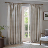 Hebden Striped Cotton Pencil Pleat Curtains in Mole hang from a wooden pole, showing fine mole-brown ticking stripes on pale cotton with a pencil pleat header.