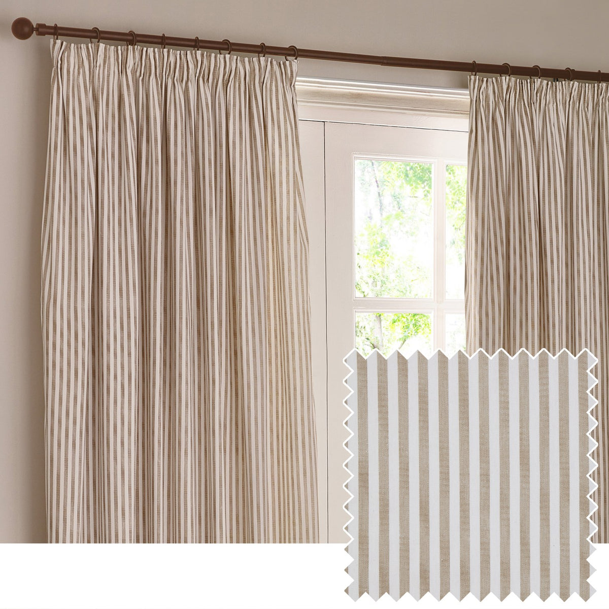 Hebden striped cotton pencil pleat curtains in natural tan and off-white, hung on a dark pole beside a window, with a fabric swatch inset showing the vertical stripe weave.