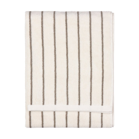 Folded Hebden Striped Cotton Towel in cream with narrow mole brown vertical stripes and a plain woven border, shown on a white background.