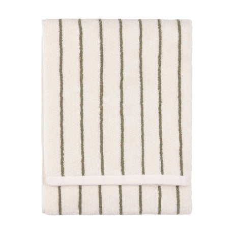 Folded Hebden cotton towel in cream with narrow olive-green vertical stripes and visible terry pile, shown on a plain white background.