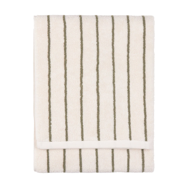 Folded Hebden cotton towel in cream with narrow olive-green vertical stripes and visible terry pile, shown on a plain white background.