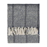 Hedon Striped Polyester Throw in navy and cream marl, folded flat with knotted fringe tassels at each end, shown on a plain white background.