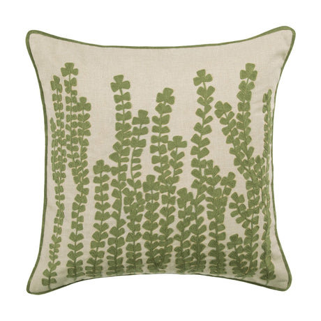 Square linen cushion with sage green embroidered fern fronds trailing up from the base on a natural fabric ground, finished with matching green piping, shown on a plain white background.