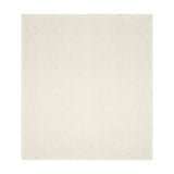 Hermione Linen Cotton Bedspread in cream with a diamond quilted pattern and a ruffled edge trim, shown against a plain white background.