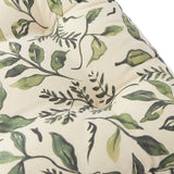 Close-up of the Herb Garden Linen Cotton Seat Pad in green, showing tufted slub cotton fabric with a printed herb foliage design on a cream ground.