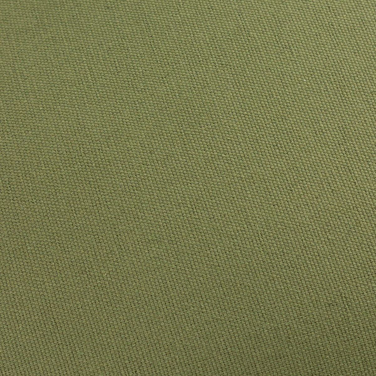Close-up of the Holmfirth Canvas cushion's woven texture in muted eucalyptus green, showing the plain cotton canvas surface with a matt, flat finish.